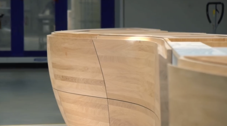 Segmented curved wooden counter by Hoffmann Interior