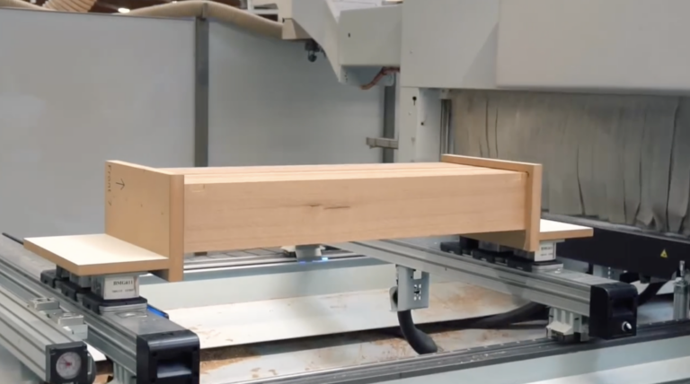 Glued wooden blank clamped on the CNC machining centre