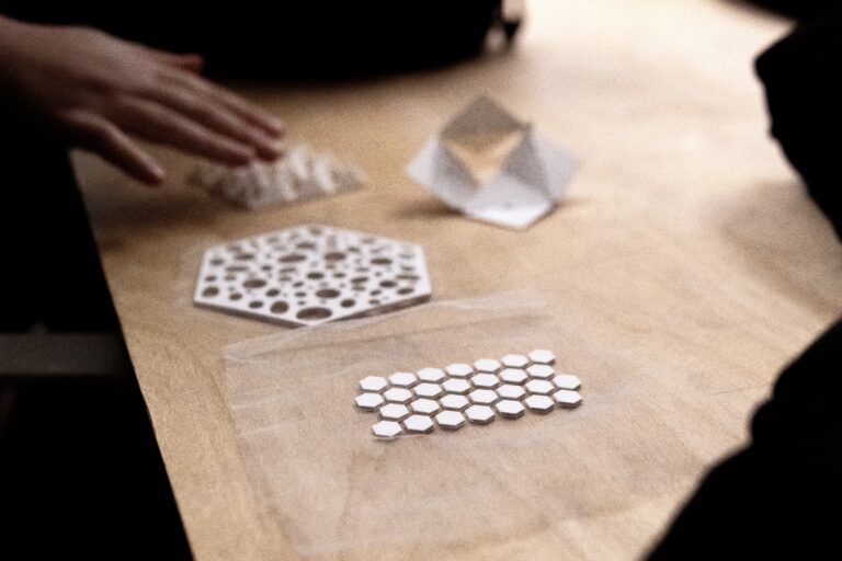 3D-printed hexagonal pattern samples on a table